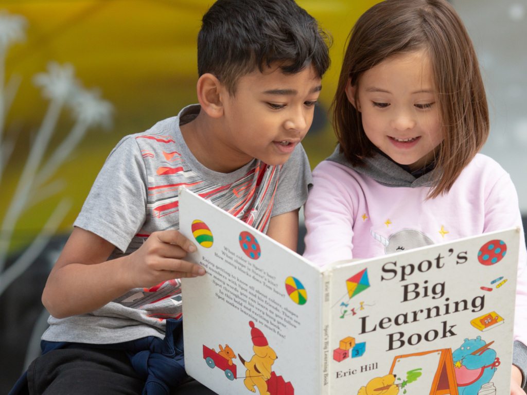 Boy and Girl read Spot's Big Learning Book
